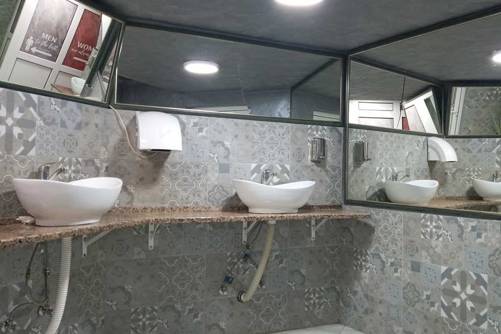 Interior of Potty Time USA's 2-station luxury restroom trailer rental in Macomb County, MI